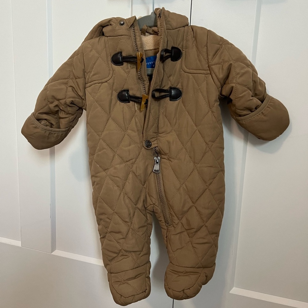 Water resistant snowsuit with fleece inside.